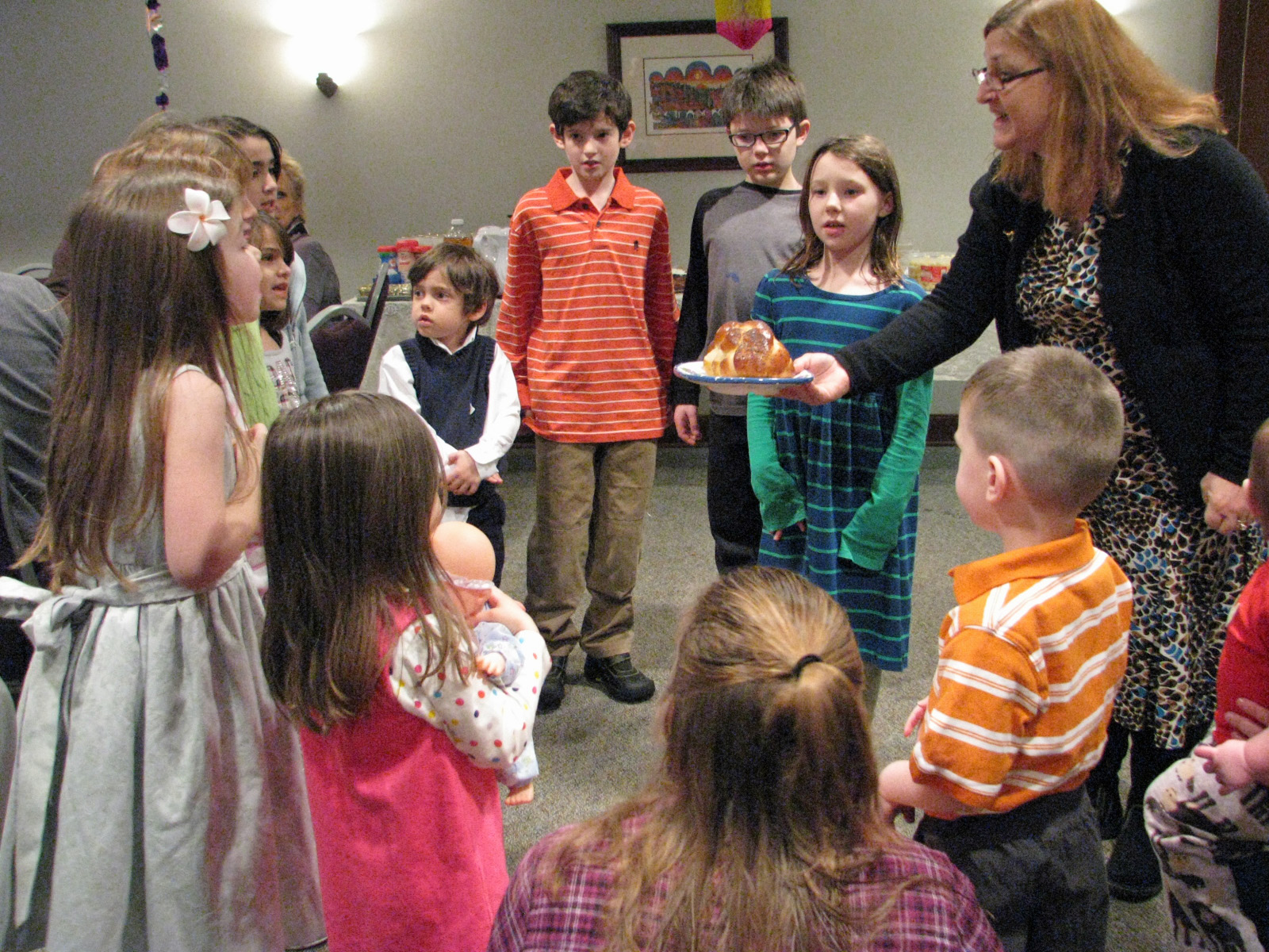 children blessing bread